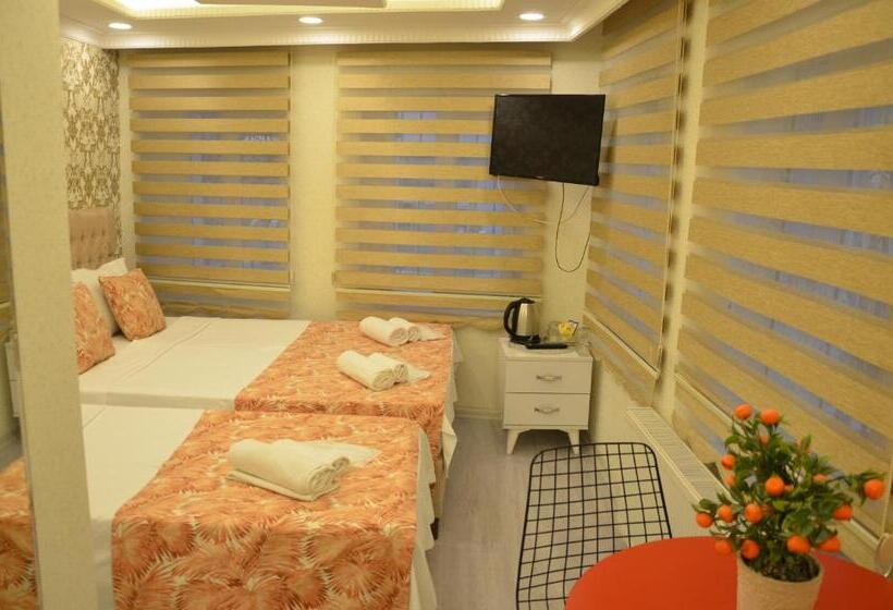 Quarto Triplo Estandar com Sacada, Işıl