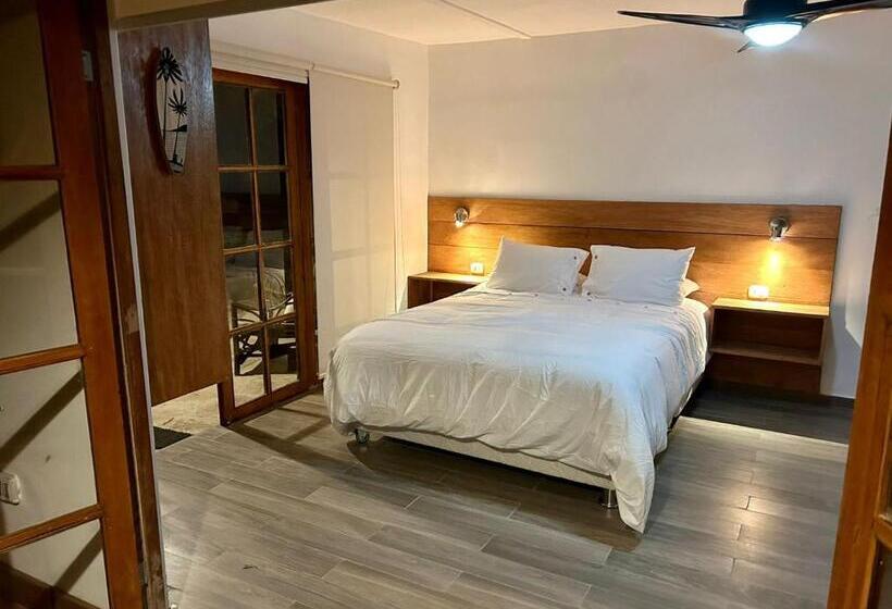 Quarto Quadruple Standart Vista Jardim, Casa Canoa