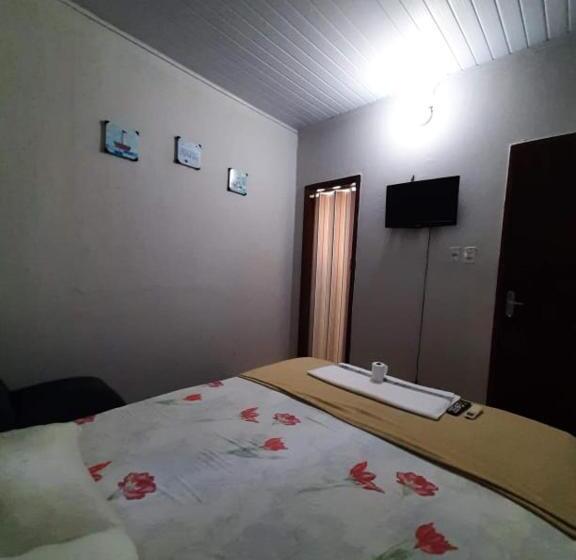 Quarto Estandar, Perola Ltda
