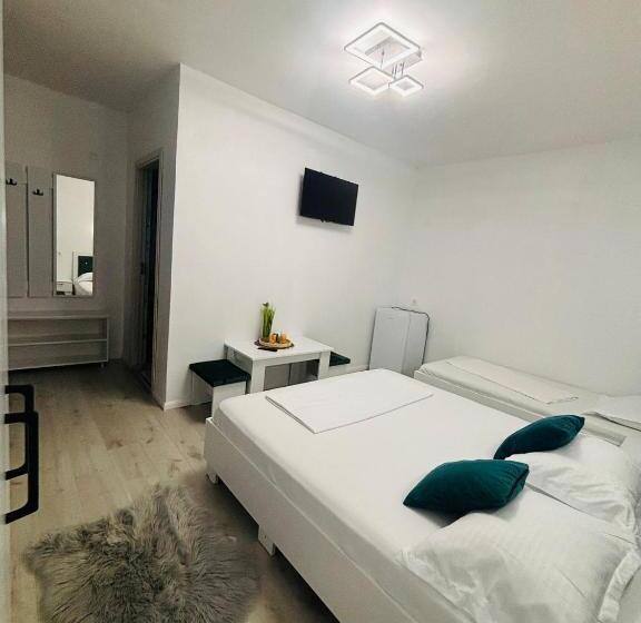 Quarto Triplo Estandar, Casa Coman