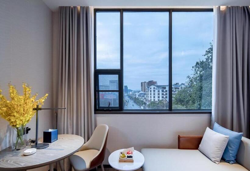 Номер Стандарт Трехместный, Echarm Hotel Hechi Bama Branch