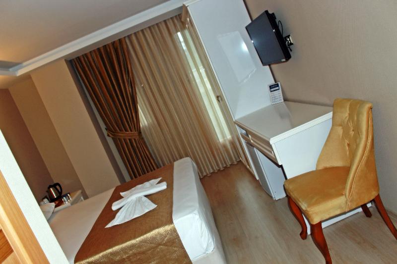Quarto standard vista mar lateral, Feza Otel