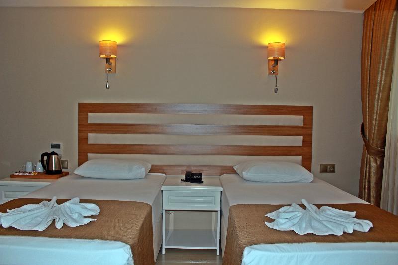 Quarto standard vista mar lateral, Feza Otel