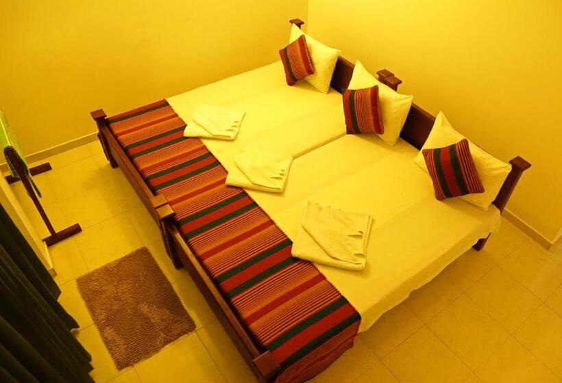 Quarto Familiar, Vishmee Holiday Inn