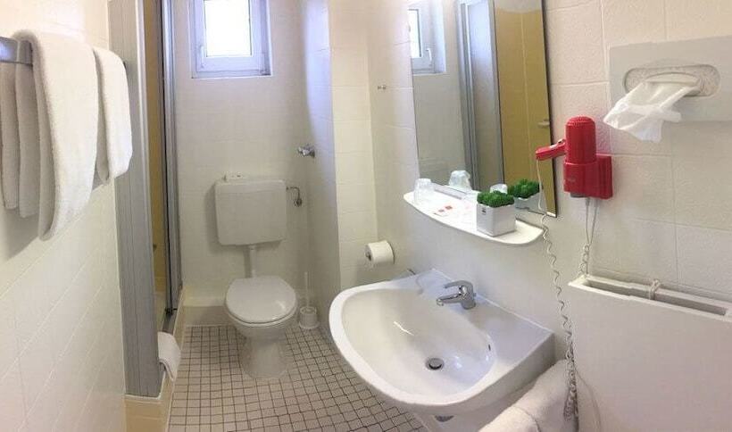 Quarto Estandar Individual, Krone