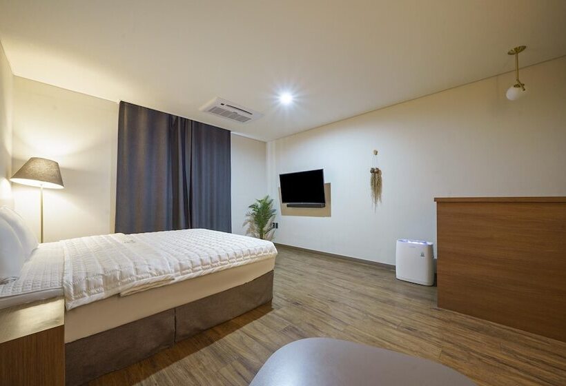 Quarto Deluxe Cama King, Mtm Family