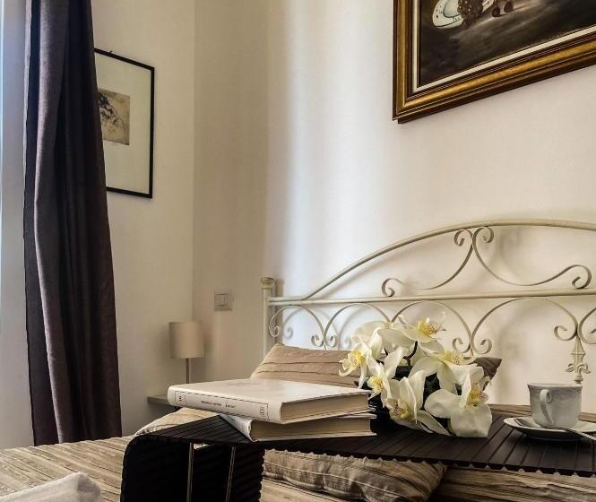 Quarto Quadruple Standart com Varanda, Cala Di Rio B&b