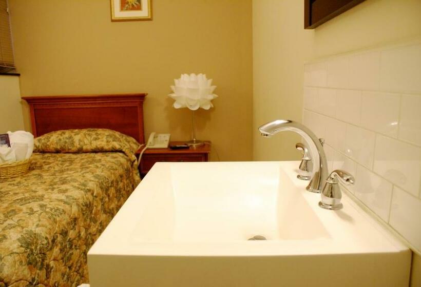 اتاق استاندارد یک تخته با سرویس بهداشتی مشترک, Americana Inn