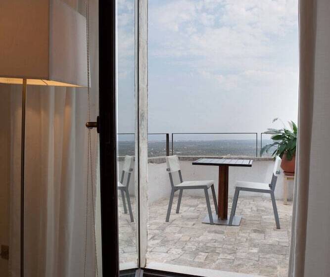 Quarto Deluxe Vista Mar com Sacada, La Sommità Relais & Chateaux