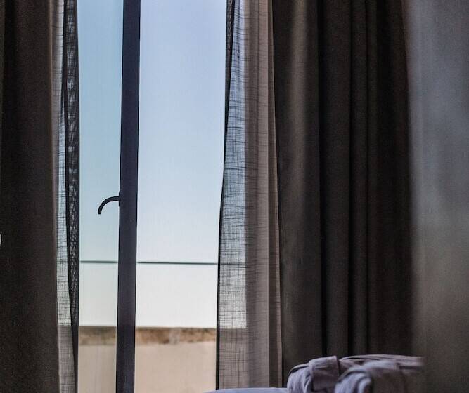 Quarto Deluxe Vista Mar com Sacada, La Sommità Relais & Chateaux