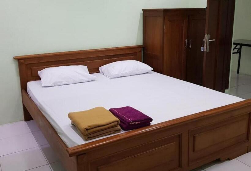Номер Deluxe, Embe Pitoe Syariah Gejayan Mitra Reddoorz