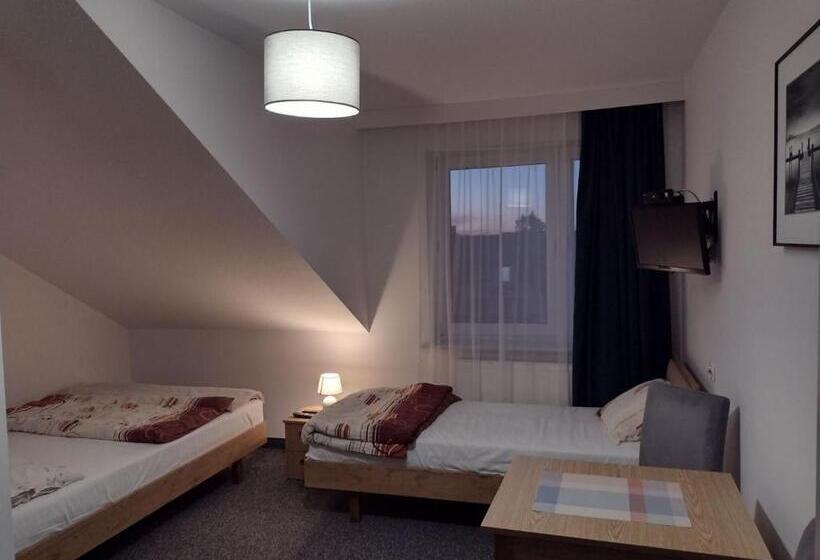 Quarto Triplo Clássico, Dom Gościnny Krystyna