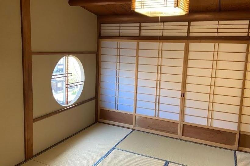 Chambre Quadruple Standard Salle de Bains Commune, ゲストハウス　華屋 (guest House Hanaya）