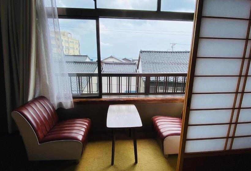 Chambre Quadruple Standard Salle de Bains Commune, ゲストハウス　華屋 (guest House Hanaya）