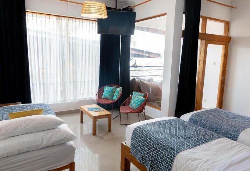 Quarto Triplo Standart Vista Mar Lateral, Pesona Beach Resort & Spa