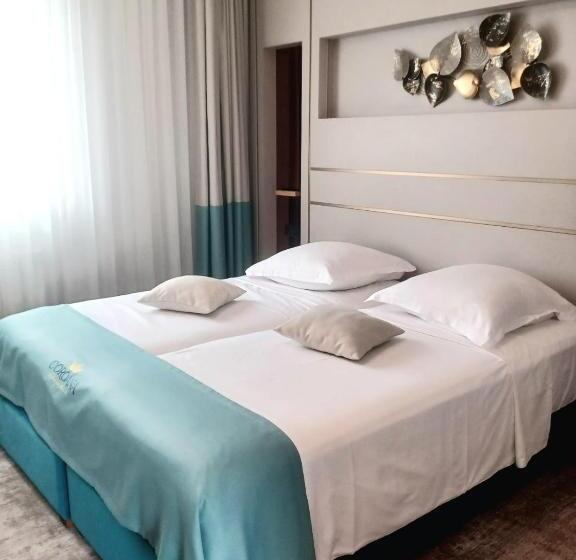 اتاق لوکس, Coroana