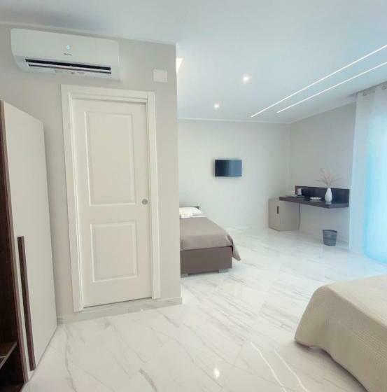 Quarto Quádruplo Estandar, Meligrana Central Rooms