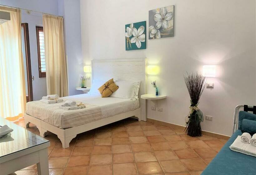 Quarto Quadruple Standart com Varanda, Badia Rooms & Breakfast