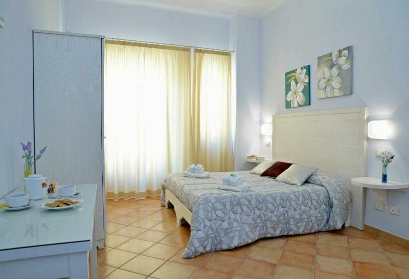 Quarto Quadruple Standart com Varanda, Badia Rooms & Breakfast