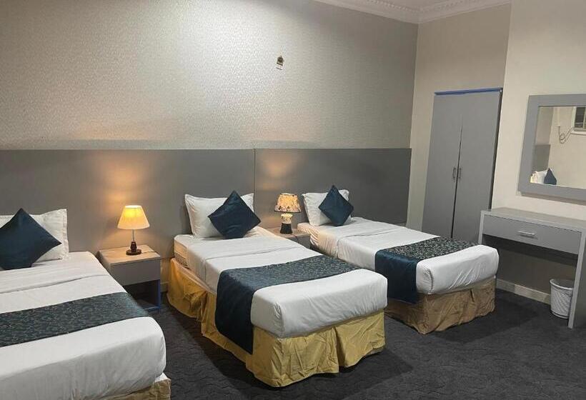 Quarto Triplo Economy, اسفار الواحة Asfar