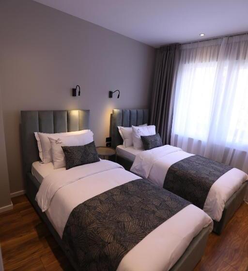 标准三人间, Dallga Suites