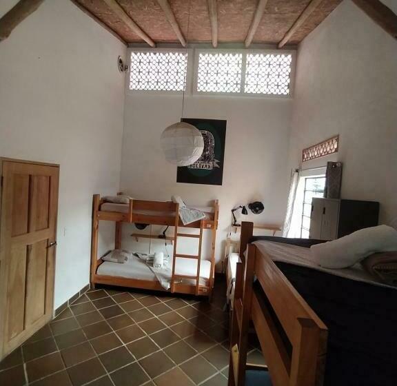 سرير فى غرفة مشتركه, Finca Hostal Bolivar   Casa Maracuya