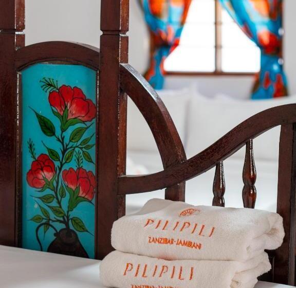 Economy Quadruple Room, Pili Pili Beach Bungalows