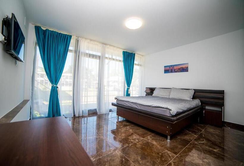 Quarto Deluxe, Vila Tributte