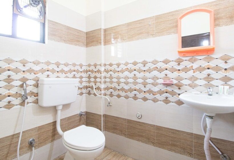 Habitación Deluxe, Treebo Midtown