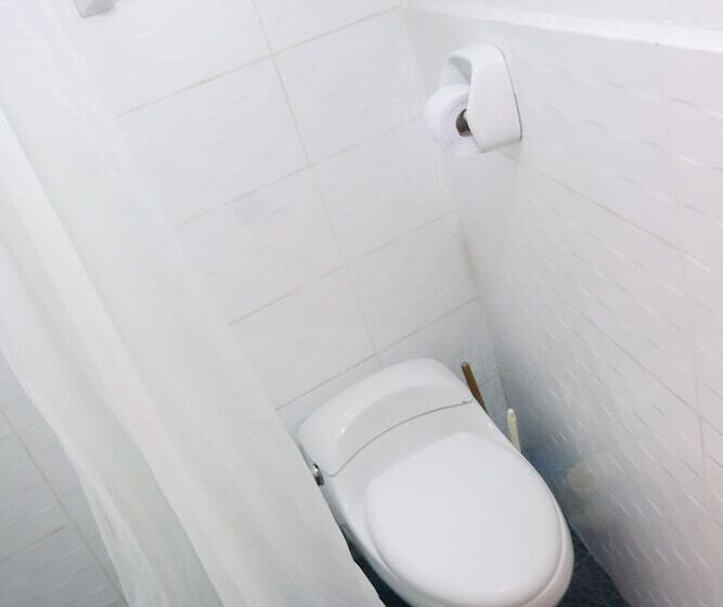 سرير فى غرفة مشتركه, The Rooftop Hostel Cusco