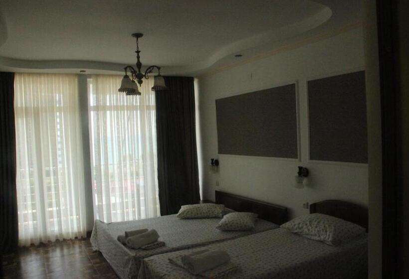 带海景标准四人间, Badu Guest House