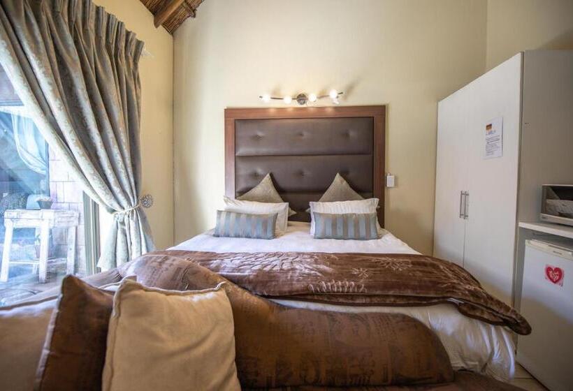 디럭스 룸, Thatch Haven Guesthouse