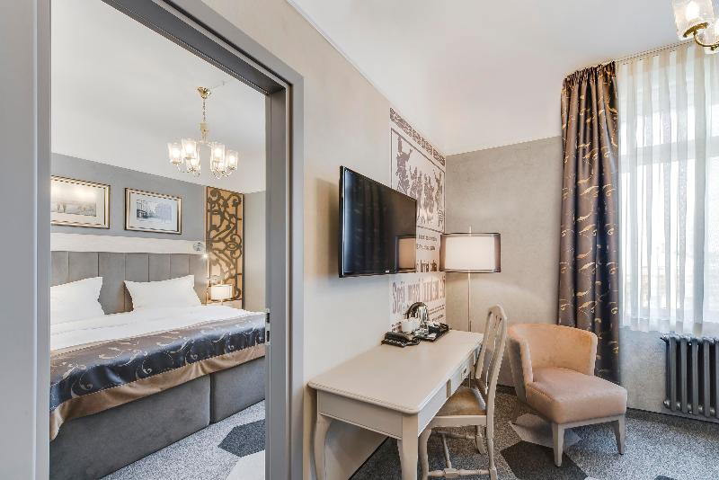 Quarto deluxe, Metropole Hotel By Semarah