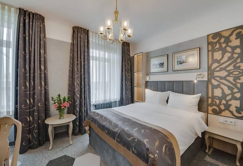 Quarto standard, Metropole Hotel By Semarah