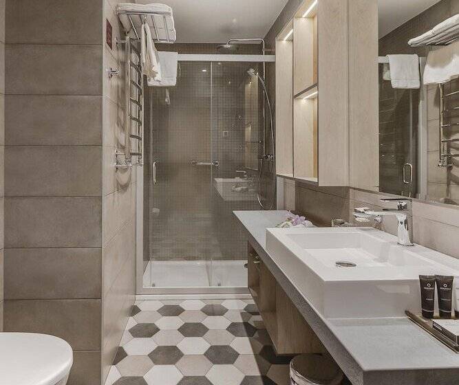 Quarto deluxe, Metropole Hotel By Semarah