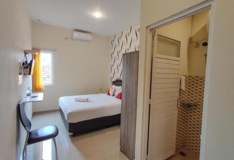 Номер Deluxe, Ayuning Guest House Syariah Semarang Mitra Reddoorz