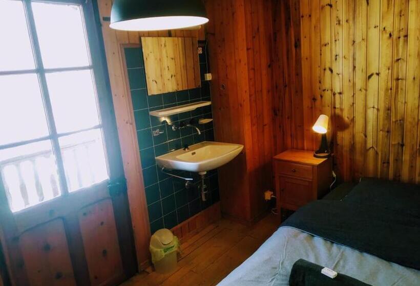 バルコニー付きシングルスタンダードルーム, Hôtel Pension Du Lac Bleu
