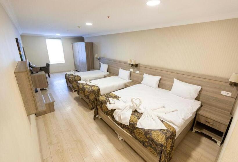 Quarto Quádruplo Estandar, World Point Hotel Besyol