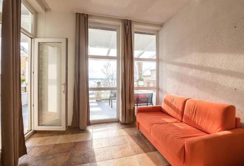 חדר משפחתי נוף לים, Aparthotel Roccia