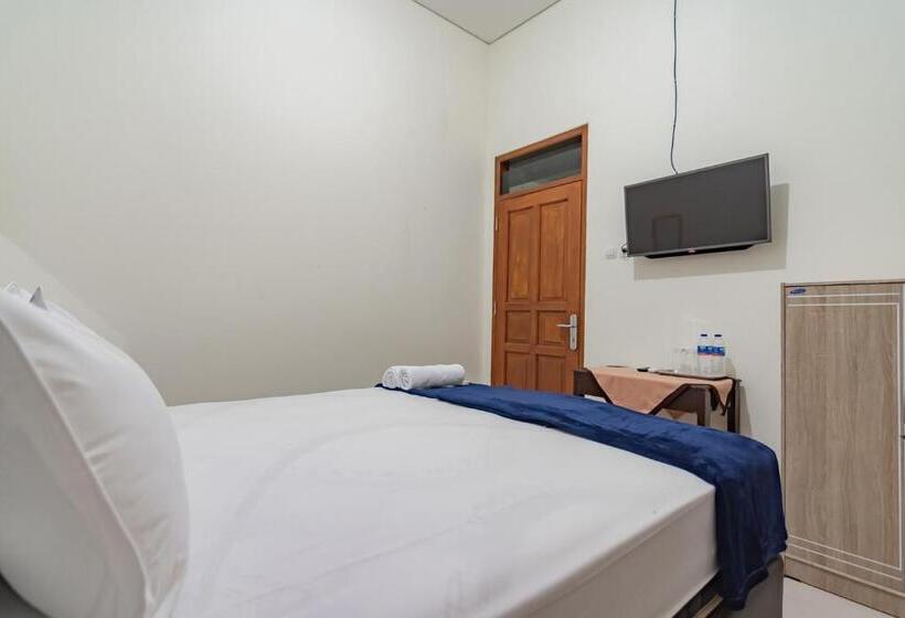 Номер Стандарт, The Lima Guest House Syariah Mitra Reddoorz