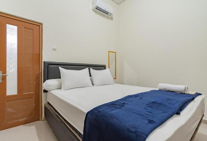 Номер Стандарт, The Lima Guest House Syariah Mitra Reddoorz