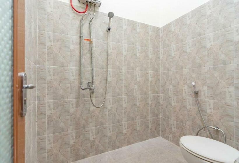 Номер Стандарт, The Lima Guest House Syariah Mitra Reddoorz