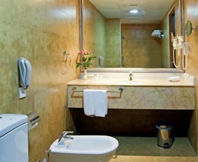 Quarto Deluxe, Swiss Belhotel Doha