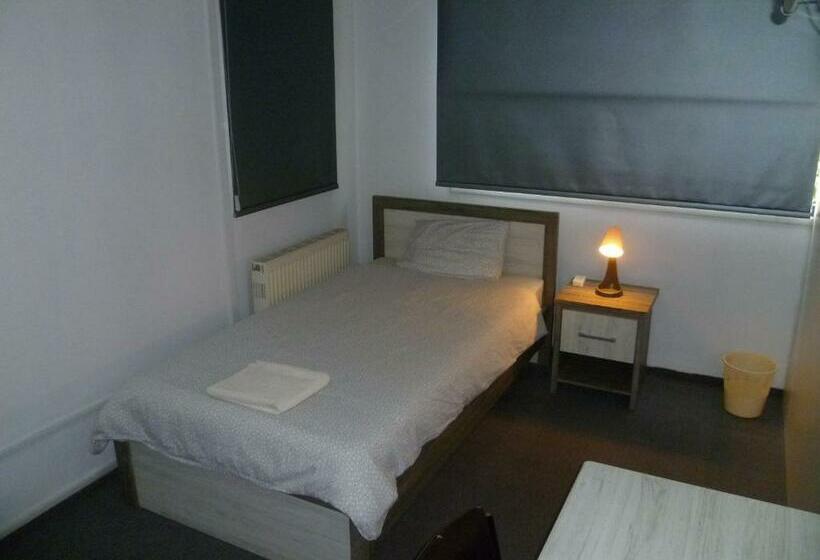 اتاق استاندارد یک تخته با سرویس بهداشتی مشترک, Datacom Guest House