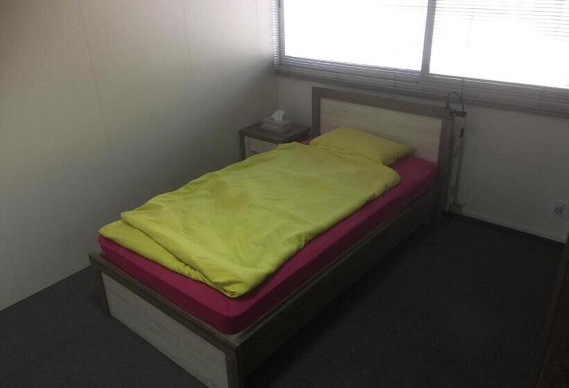 اتاق استاندارد یک تخته با سرویس بهداشتی مشترک, Datacom Guest House