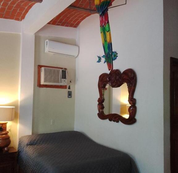 חדר לארבעה סטנדרטי עם נוף לגינה, Villa Corona Del Mar