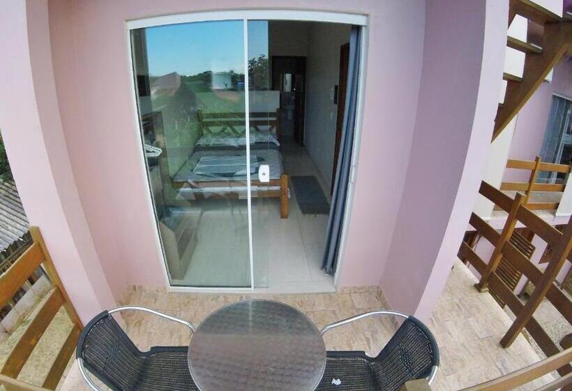 Quarto Estandar, Origin Acomodações