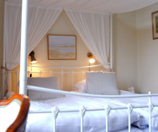 Quarto Estandar, Strand
