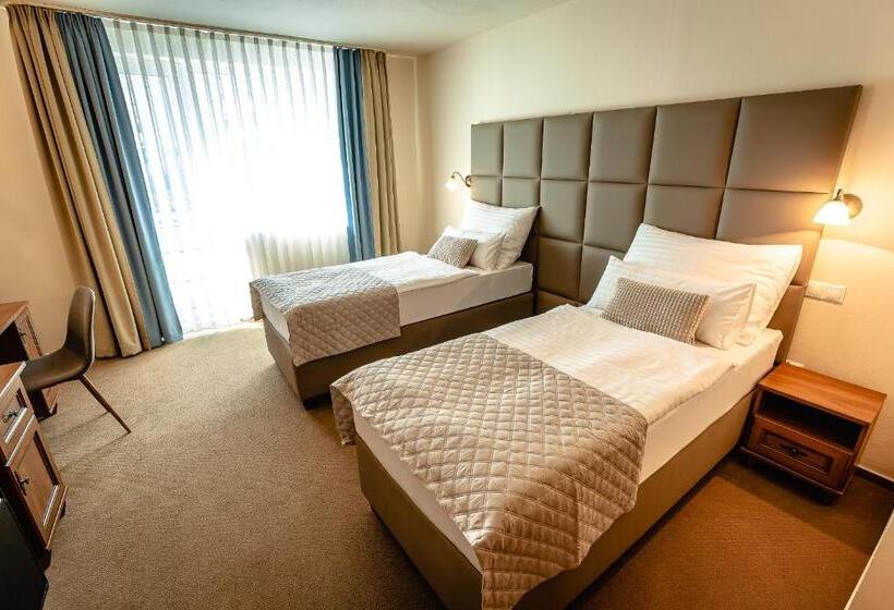 Quarto Comfort, Dixon