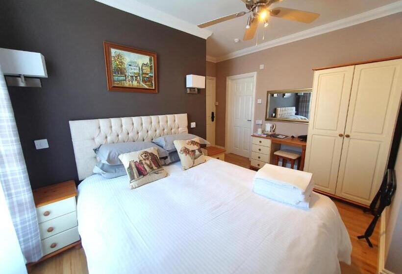 Quarto Economy, Midway Guest House